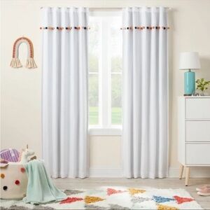 White Curtains with Colorful Pom-Poms